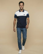 Polo manga corta con diseño de bloques y ribetes a rayas - Azul