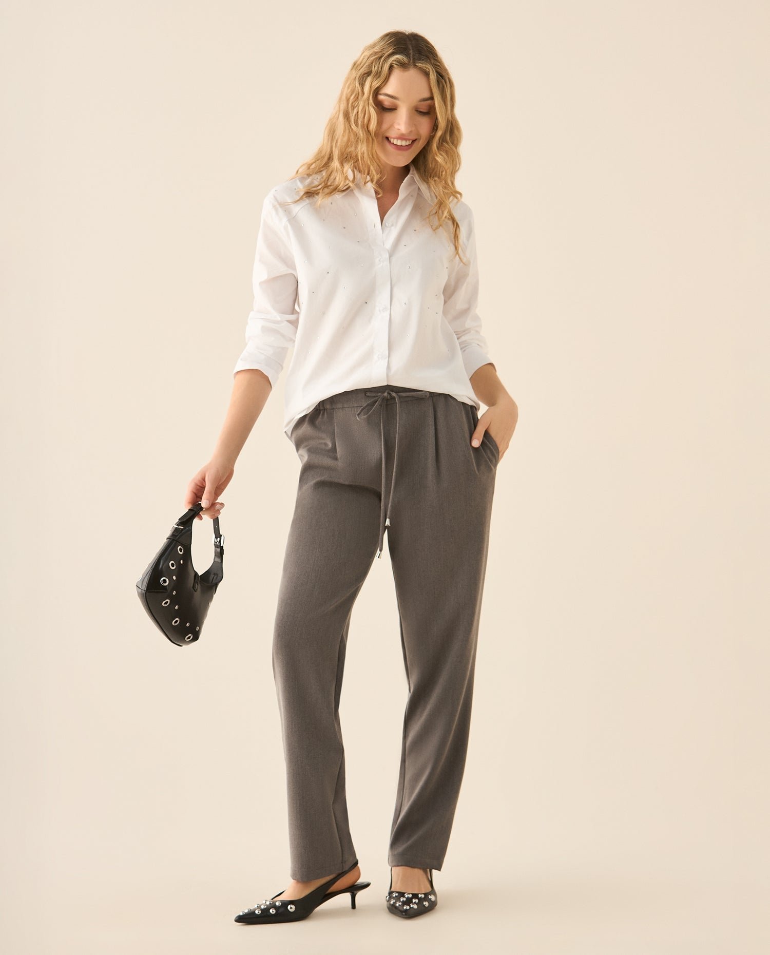 Pantalón de tela con elasticidad para mujer - Gris