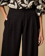 Pantalón palazzo tobillero de caída fluida - Negro