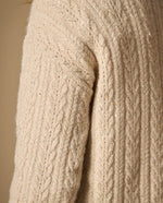 Chaleco tejido con diseño de trenzas y detalles brillantes - Beige